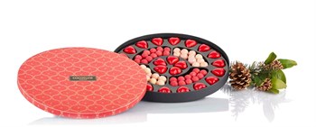 560g. Fyldte chokoladehjerter, stockholm & Tokyo i rød rund PALÆ æske.